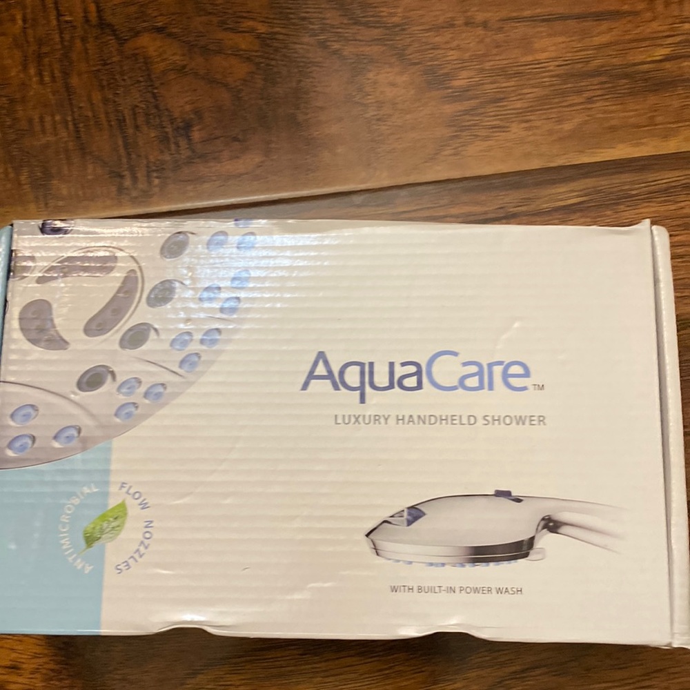 New Aquacare luxury handheld shower with built in power wash